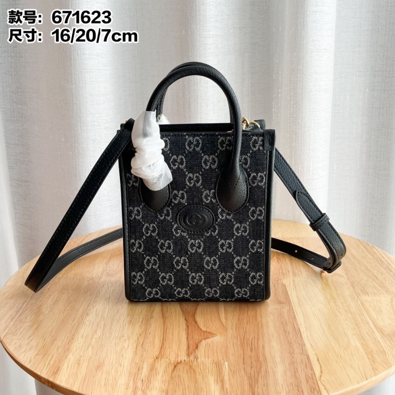 G*u*i top handle bags